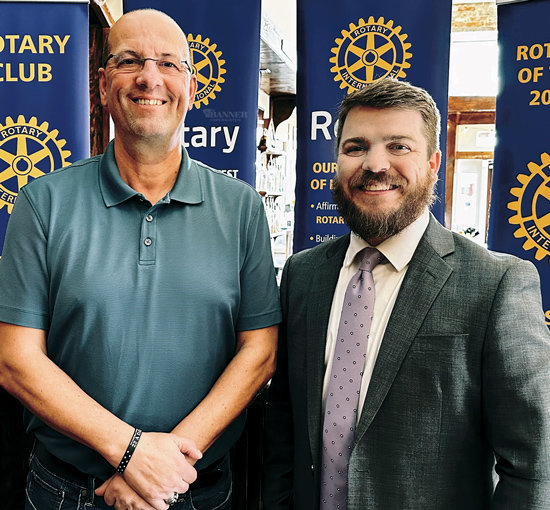 (L to R) Spiros Roditis, vice-president of McKenzie Rotary and Joseph Butler, mayor of the County of Carroll.