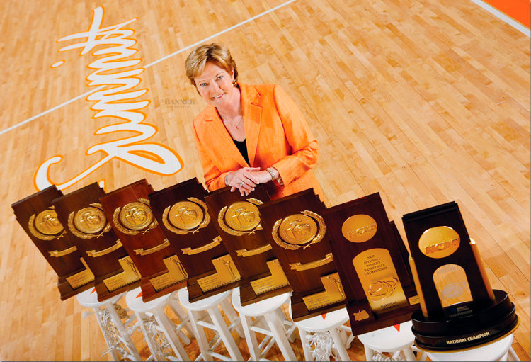 Pat Summitt pictured with her 8 NCAA championship trophies.