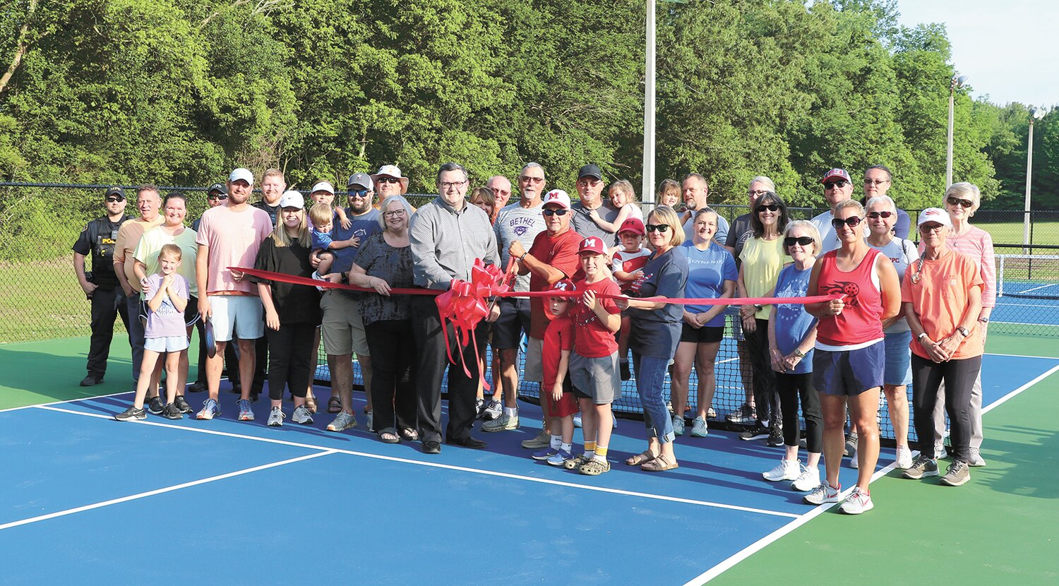 Bridget Pittman, Matthew Pittman, Gary Pittman, Meagan Tucker of Dresden and Stacey French of Paris were some of the first players to fill the six courts.