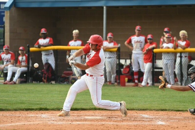 MHS Senior Ty Anderson earns an RBI to score the first run of the game. Photo by Erin Douglas.