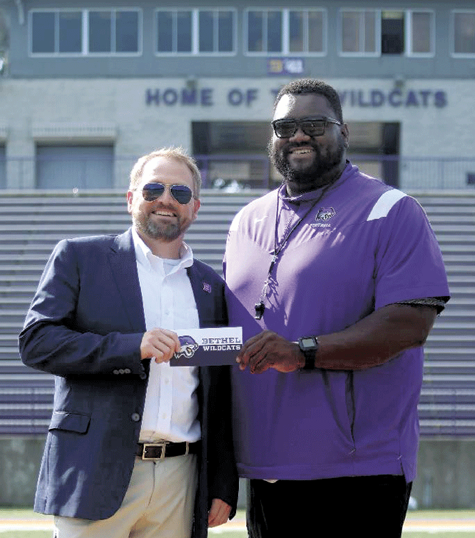 Bethel University's Athletic Director Brad Chappell and Michael Jasper, head coach of the Bethel University Wildcat football team. Jasper and his team were notified that Jasper will be inducted into the Bethel University Sports Hall of Fame in October 2023