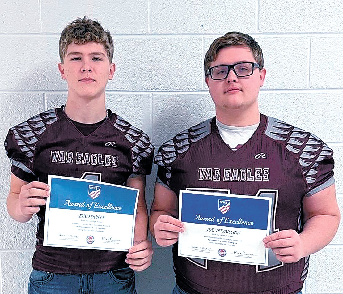 West Carroll High School's Zac Fowler and Joe Vermillion received an award for outstanding character.