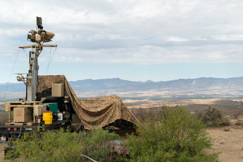 In this April 4, 2019 photo, provided by the U.S. Army, a mobile surveillance camera system manned by soldiers monitors a sector near the Presidio Border Patrol Station at Presidio, Texas. The Trump administration has been quietly adding military surveillance cameras at the U.S.-Mexico border in response to the novel coronavirus pandemic despite the fact fewer people appear to be crossing illegally. Documents obtained by The Associated Press show the Department of Defense at the request of the Department of Homeland Security sent 60 mobile surveillance cameras in addition to 540 more troops to the southwest border this month. (Sgt. Brandon Banzhaf/U.S. Army via AP)
