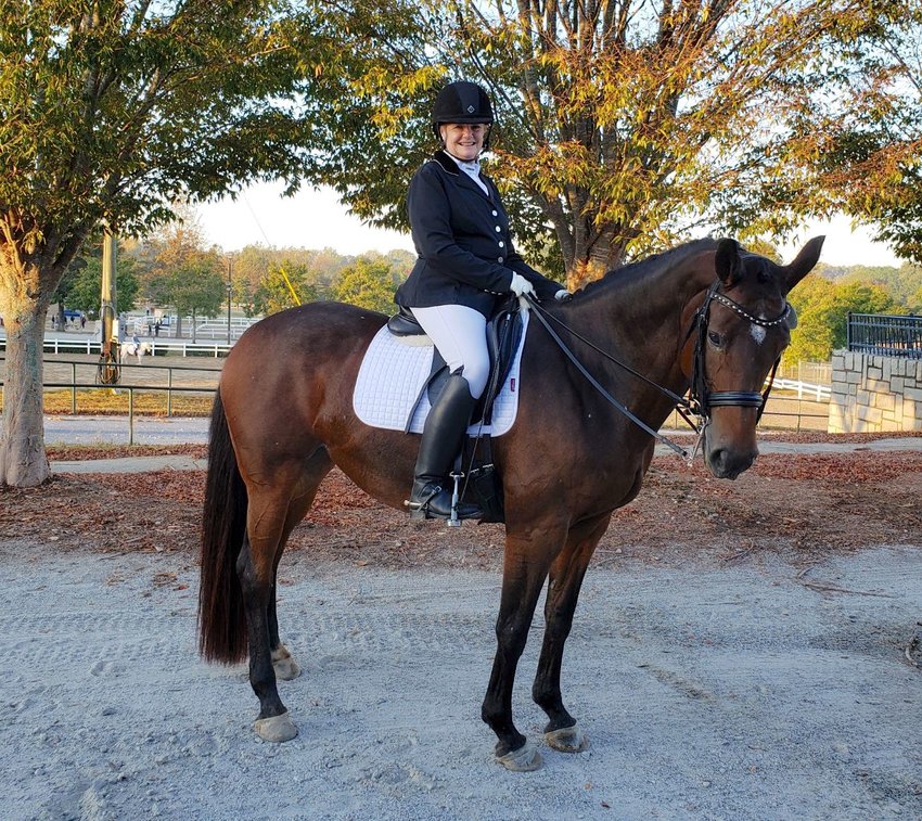 Penne Mott is retiring from Bevill State Community College to enjoy time with family and her horses. She is pictured here at a competition in Georgia last year.