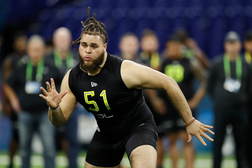 Alabama offensive lineman Jedrick Wills runs a drill at the NFL football scouting combine in Indianapolis, Friday, Feb. 28, 2020. (AP Photo/Charlie Neibergall)
