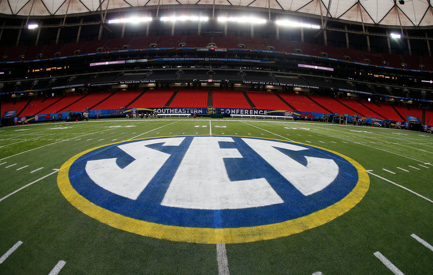 The SEC logo is seen Friday, Dec. 5, 2014, in Atlanta, ahead of the Southeastern Conference championship football game between Alabama and Missouri held Saturday. (AP Photo/John Bazemore)