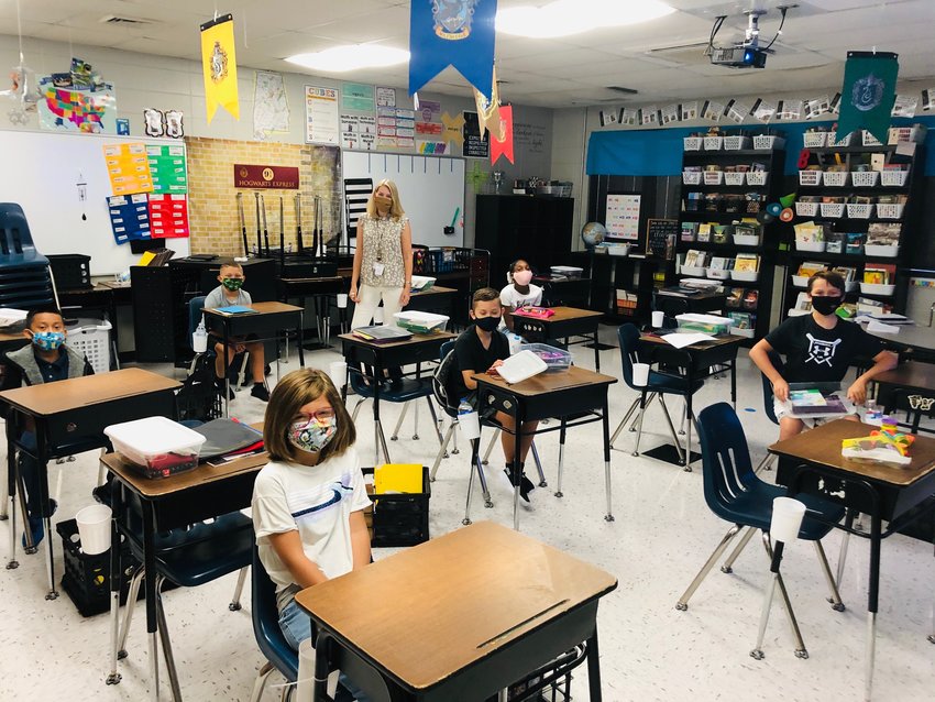 Students in Jasper City Schools returned to school on Thursday. Schools utilized infrared scanners and no-touch thermometers to screen students for COVID-19. Partitions were used and students older than 6 were required to wear face masks. Principals reported a good first day back.