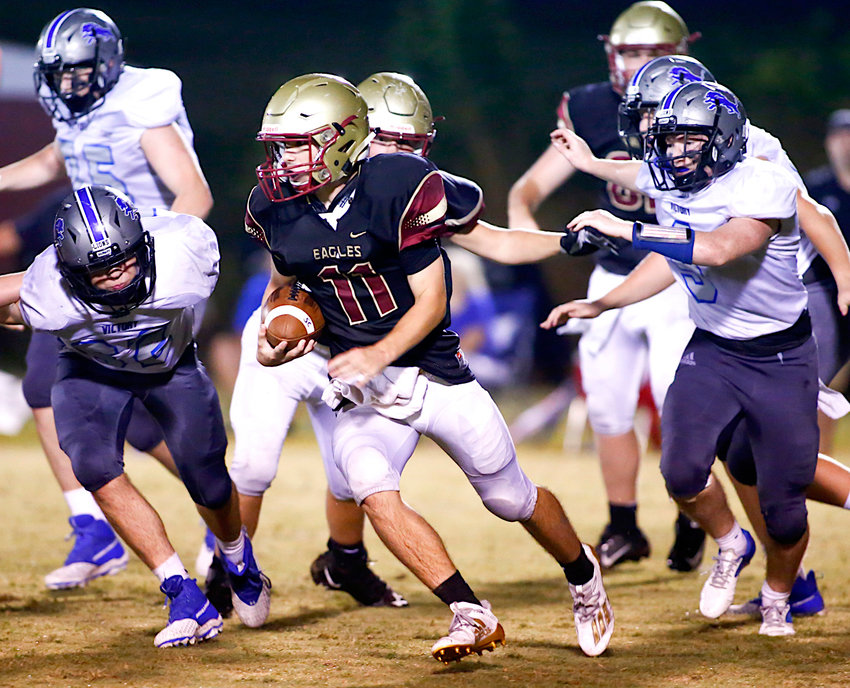 Sumiton Christian's Eli Moon looks for running room against Victory Christian during their game Friday night.
