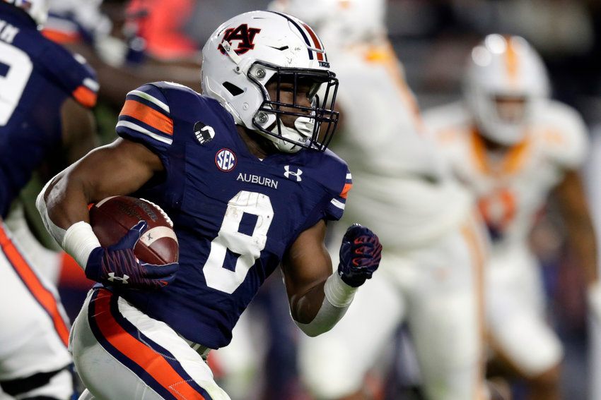 Auburn running back Shaun Shivers carries the ball during the first half of the team's NCAA college football game against Tennessee on Saturday, Nov. 21, 2020, in Auburn, Ala. (AP Photo/Butch Dill)