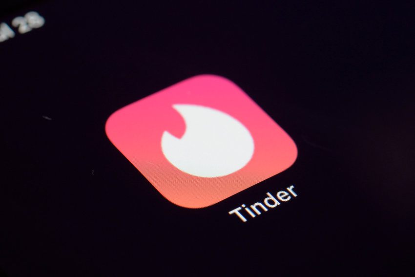 This Tuesday, July 28, 2020 photo shows the icon for the Tinder dating app on a device in New York. (AP Photo/Patrick Sison)