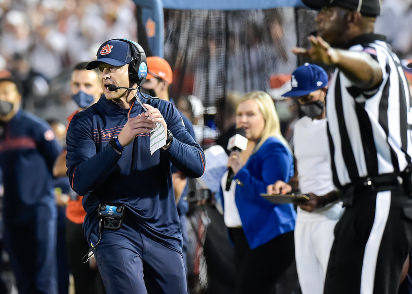 Auburn Tigers head coach Bryan Harsin calls for a timeout  during the second half of Saturday&rsquo;s NCAA football game, at Beaver Stadium in University Park PA. Daily Mountain Eagle -  Jeff Johnsey