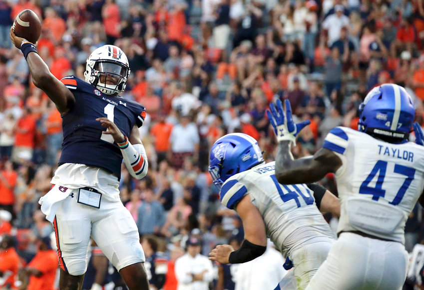 Auburn quarterback TJ Finley (1) throws a pass for a touchdown to take the lead over Georgia State in  the final minute of the second half of an NCAA football game Saturday in Auburn.