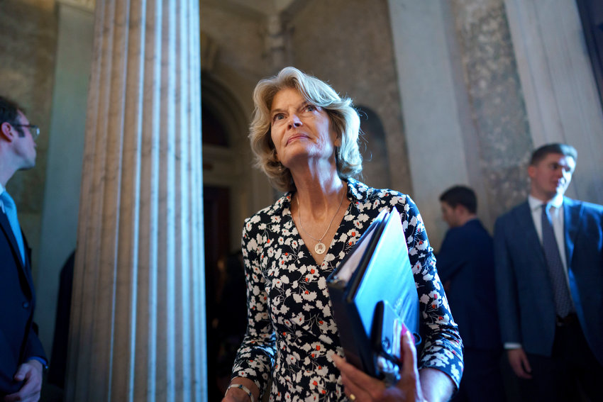 FILE - Sen. Lisa Murkowski, R-Alaska, walks to the chamber at the Capitol in Washington, Thursday, Aug. 5, 2021. Murkowski, who voted to convict Donald Trump in his second impeachment trial and has repeatedly bumped heads with the former president, announced Friday, Nov. 12, that she will run for reelection. (AP Photo/J. Scott Applewhite, File)