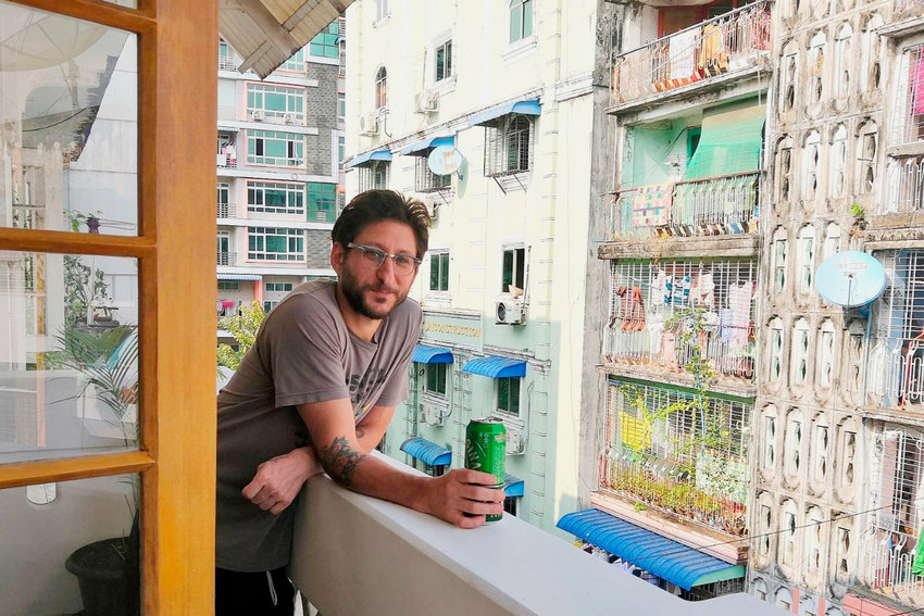 This photo provided by the family courtesy shows Danny Fenster posing for a photo in Yangon, Myanmar, in 2020. A court in military-ruled Myanmar on Friday, Nov. 12, 2021, sentenced detained U.S. journalist Fenster to 11 years in prison after finding him guilty on several charges, including incitement for allegedly spreading false or inflammatory information. (family courtesy photo via AP)