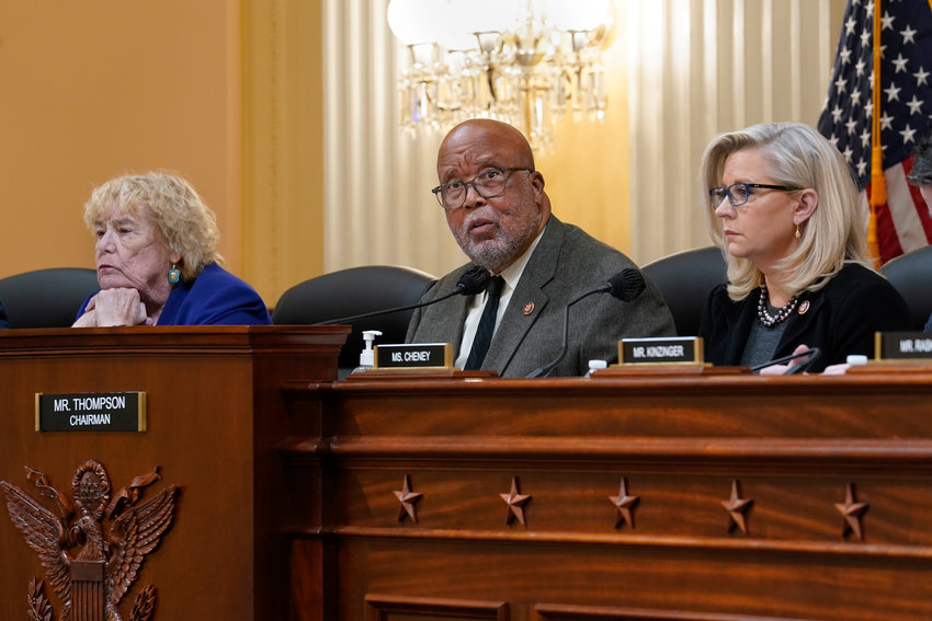 House Jan. 6 Select Committee Chairman Bennie Thompson, D-Miss., center, flanked by Rep. Zoe Lofgren, D-Calif., left, and Vice Chair Liz Cheney, R-Wyo., meet to vote on pursuing contempt charges against Jeffrey Clark, a former Justice Department lawyer who aligned with former President Donald Trump as Trump tried to overturn his election defeat, at the Capitol in Washington, Wednesday, Dec. 1, 2021. (AP Photo/J. Scott Applewhite).