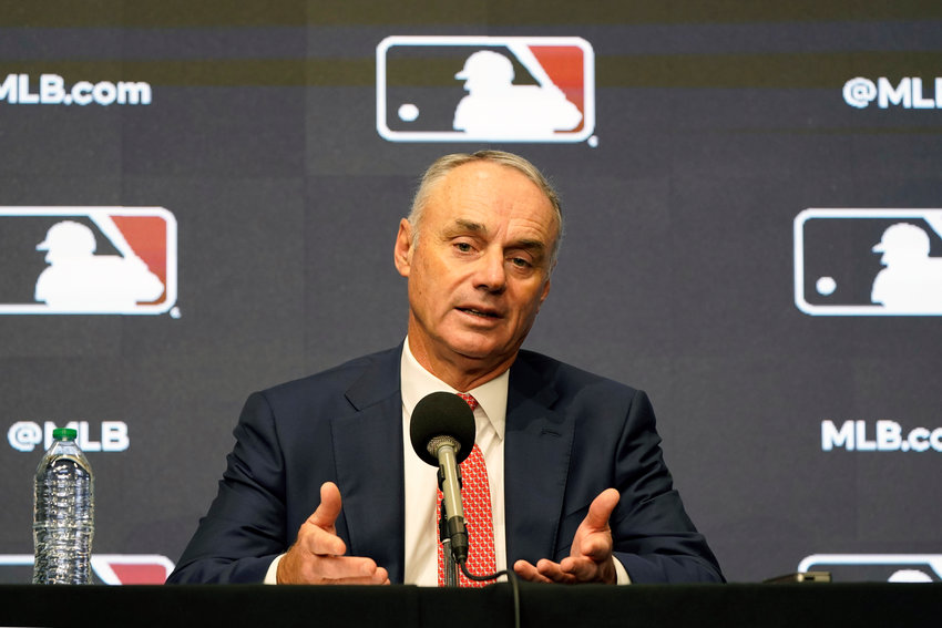 Major League Baseball commissioner Rob Manfred speaks during a news conference in Arlington, Texa, Thursday, Dec. 2, 2021. (AP Photo/LM Otero)