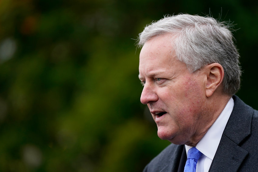 White House chief of staff Mark Meadows speaks with reporters outside the White House, Monday, Oct. 26, 2020, in Washington. (AP Photo/Patrick Semansky)