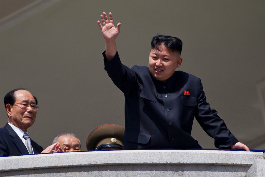 HOLD - FILE - In this April 15, 2012, file photo, North Korean leader Kim Jong Un waves from a balcony at the end of a mass military parade in Kim Il Sung Square in Pyongyng, North Korea. xxx At left is Kim Yong Nam, right, president of the Presidium of the Supreme People's Assembly of North Korea. (AP Photo/David Guttenfelder. File)