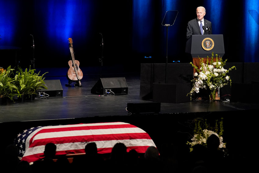 President Joe Biden speaks during a memorial service for former Senate Majority Leader Harry Reid at the Smith Center in Las Vegas, on  Jan. 8, 2022. Reid will lie in state at the Capitol. Reid will memorialized Wednesday in the Capitol Rotunda as colleagues and guests pay tribute to the hardscrabble former Democratic leader. (AP Photo/John Locher)