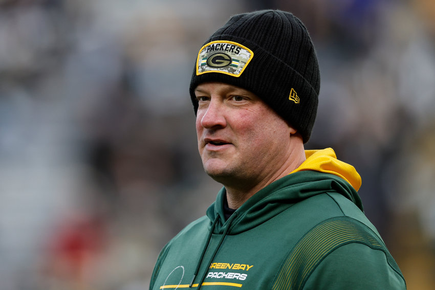 FILE - Green Bay Packers offensive coordinator Nathaniel Hackett looks on during pre-game warm-ups before an NFL football game against the Cleveland Browns Saturday, Dec. 25, 2021, in Green Bay, Wis. A person with knowledge of the negotiations told The Associated Press early Thursday morning, Jan. 27, 2022, that the Denver Broncos are finalizing a deal to hire Packers offensive coordinator as their new head coach. The person spoke on condition of anonymity because the deal was still in the works and the team hadn't announced the hiring. (AP Photo/Jeffrey Phelps, File)