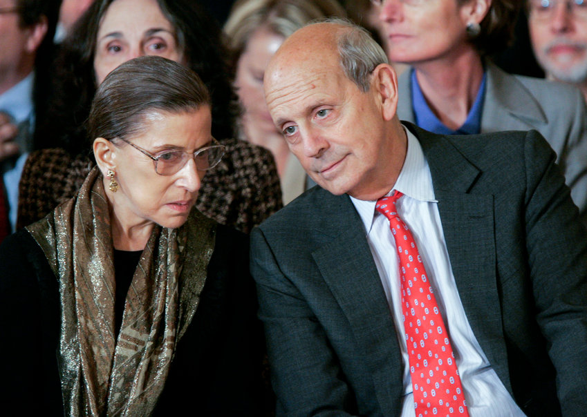 Supreme Court Justices Ruth Bader Ginsburg, left, and Stephen Breyer talk prior to a ceremonial swearing-in ceremony for new Supreme Court Justice Samuel Alito in the East Room of the White House, Wednesday, Feb. 1, 2006.  (AP Photo/Gerald Herbert)