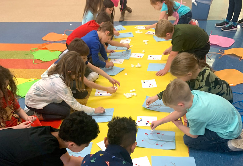 Students at Parrish Elementary School work on an art project through the Meet the Masters program.