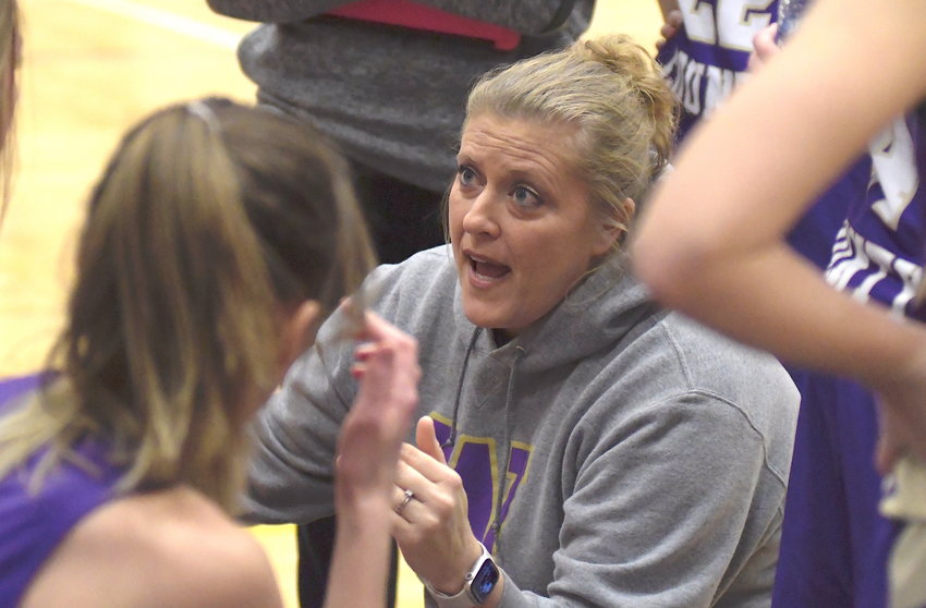 Winston County girls basketball coach Becky Cobb talks to her team during a game against Curry this season. Cobb is the Eagle Elite Girls Coach of the Year after leading the Yellow Jackets to a 27-4 record.