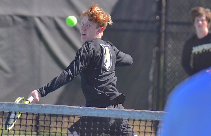 Jasper's Luke Oliver hits a backhand during a doubles match this season. Oliver has advanced to the semifinals at No. 3 singles at the Class 6A State Tennis Tournament in Mobile.