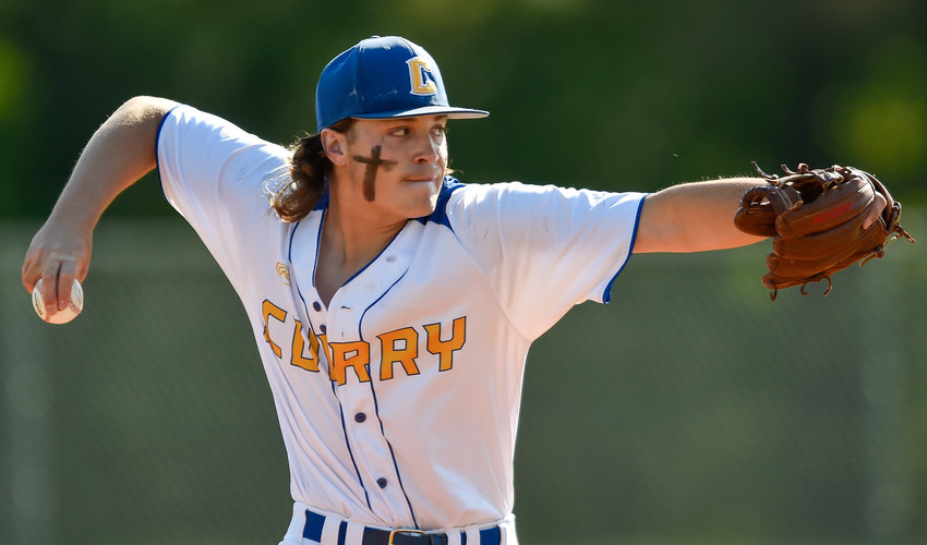 Curry's Will Haynes fires a pitch against Madison County during the first game of their double header on Friday.