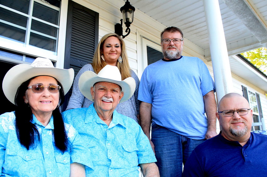 Kathy and Larry Williams are pictured recently at their home in Thach with their children: April, Greg and Chris. The couple celebrated 50 years of marriage on Friday.