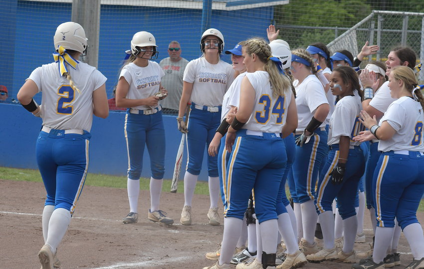 Curry's Linley Tubbs (2) heads to home plate after hitting a home run against Good Hope in the Class 4A, Area 11 Tournament at Curry High School on Tuesday.
