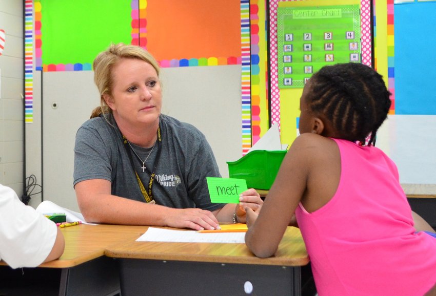 ESSER funding has allowed for more instructional support in schools. Pictured is a student receiving assistance during a summer reading program.