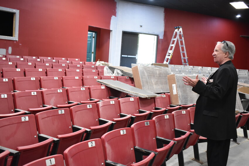 Winston County Circuit Clerk J.D. Snoddy, who is president of the Winston County Arts Council, looks at some of the $200,000 in renovations at the Dual Destiny Theater at Looney's Tavern. The first show is set for May 5-6.
