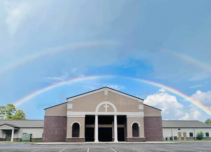 Glory Fellowship Baptist Church, seen under rainbows in an undated photo, feels it has been blessed by God as the church has seen much growth and unity, according to church officials. It is preparing to embark on a new construction program.