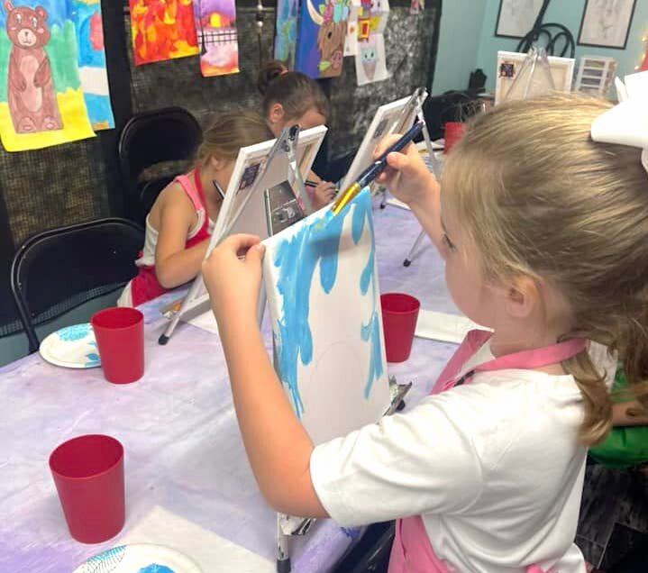 A child participates in an art class at Art &amp; Soul Studio in Jasper.