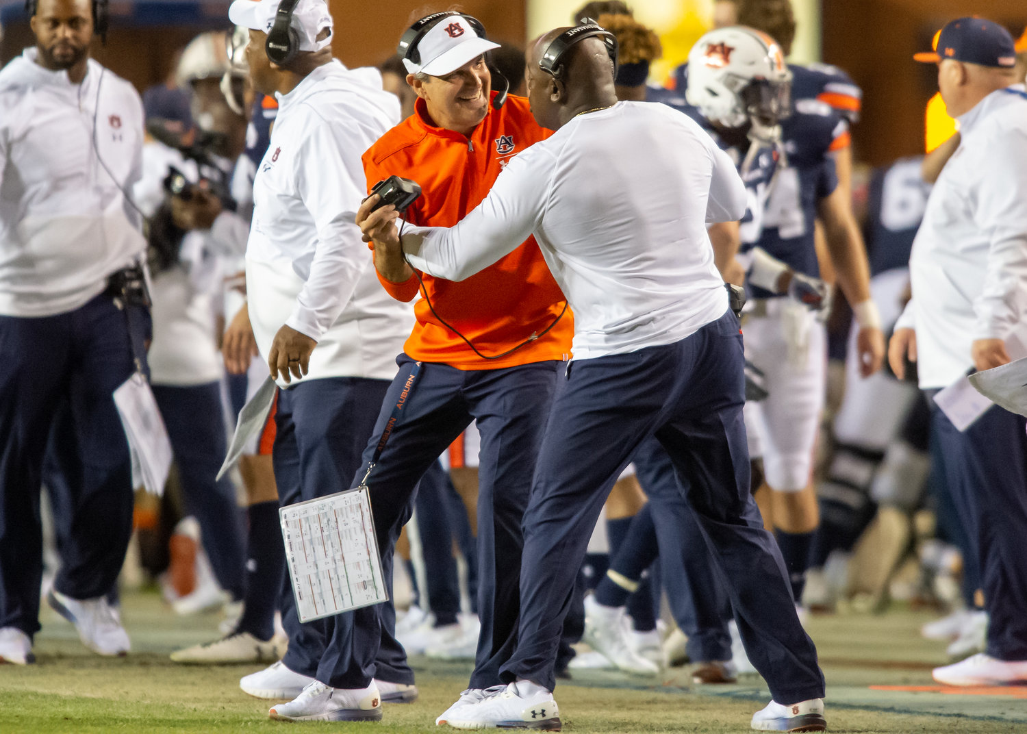 Auburn defensive coordinator Kevin Steel celebrates during the second half of Saturday's game, at Jordan-Hare Stadium in Auburn, AL. Daily Mountain Eagle -  Jeff Johnsey