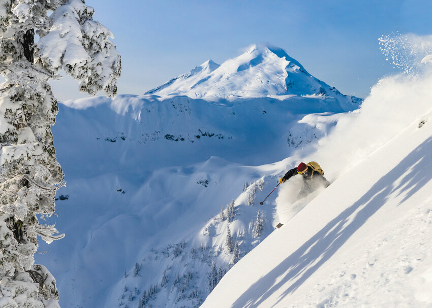 Chris Logan descends in front of Mt. Baker.