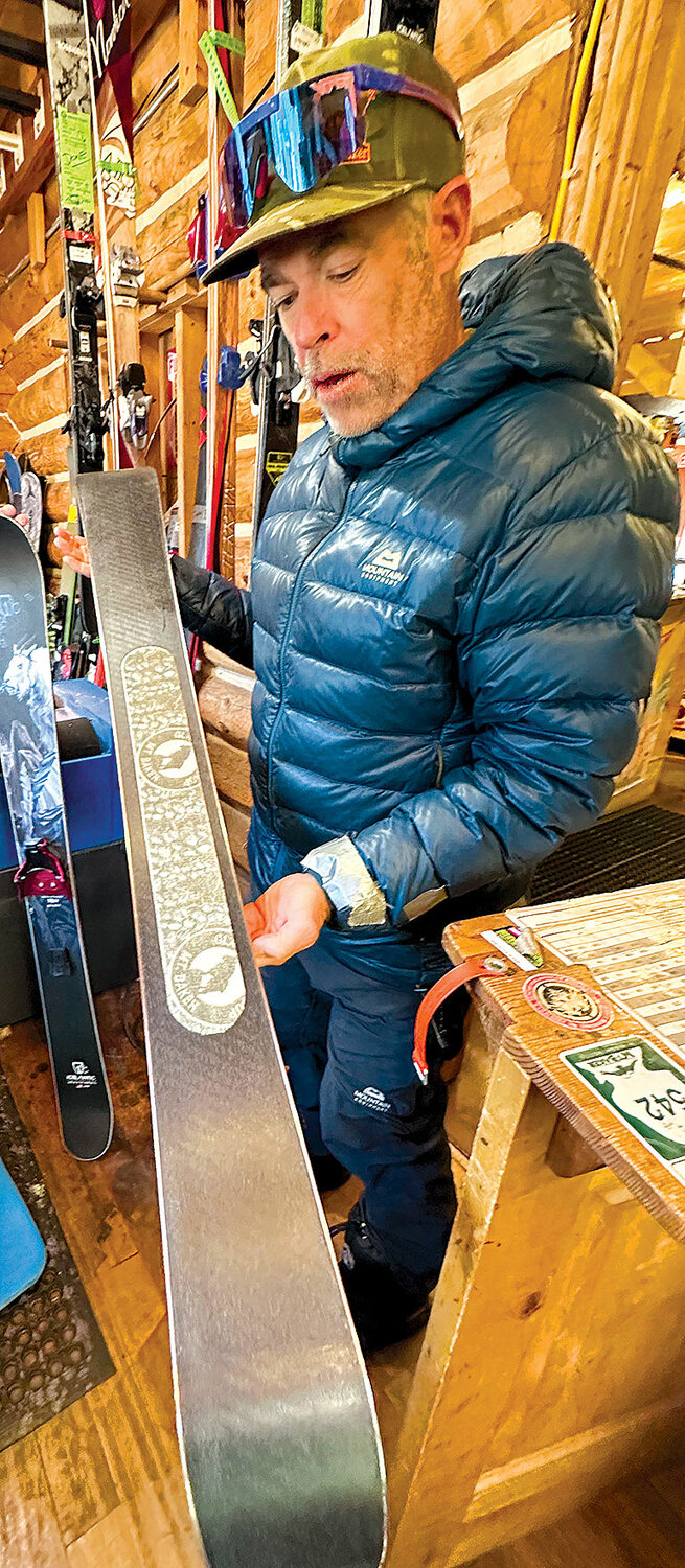 John showing snowshoe-replacing shorties with Glacier Ski Shop-branded skins.