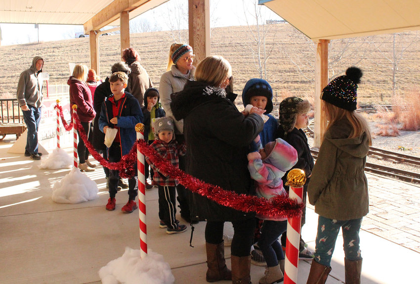 Children and adults alike eagerly waited in line for a chance to ride the train.