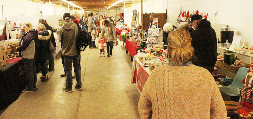 A large crowd gathered to shop over the weekend at the vendor event held in conjunction with the Polar Express event at the Harrison County Fair Grounds.