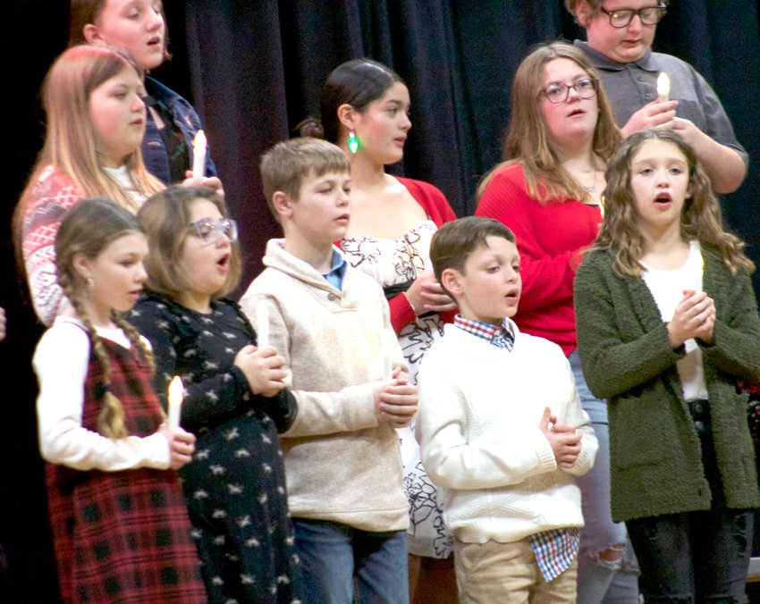 West Harrison's fifth grade lights up during their performance at the West Harrison Elementary Concert on Dec. 20 in Mondamin.