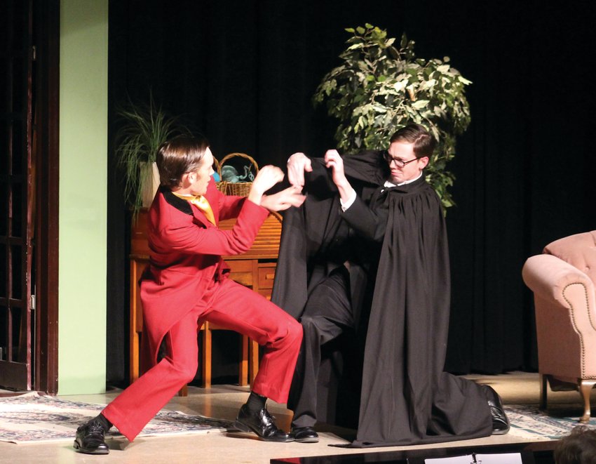 Compton (played by Brody Lager) and Craven Sinclair (played by Jordan Jager) "fight" over a disagreement during a production of "Lily, The Felon's Daughter" at the Missouri Valley High School auditorium.