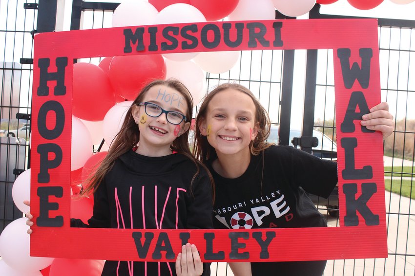 Olivia Meade and Knydence Parks were happy to spread hope with fun face paint and big smiles during the Hope Walk.