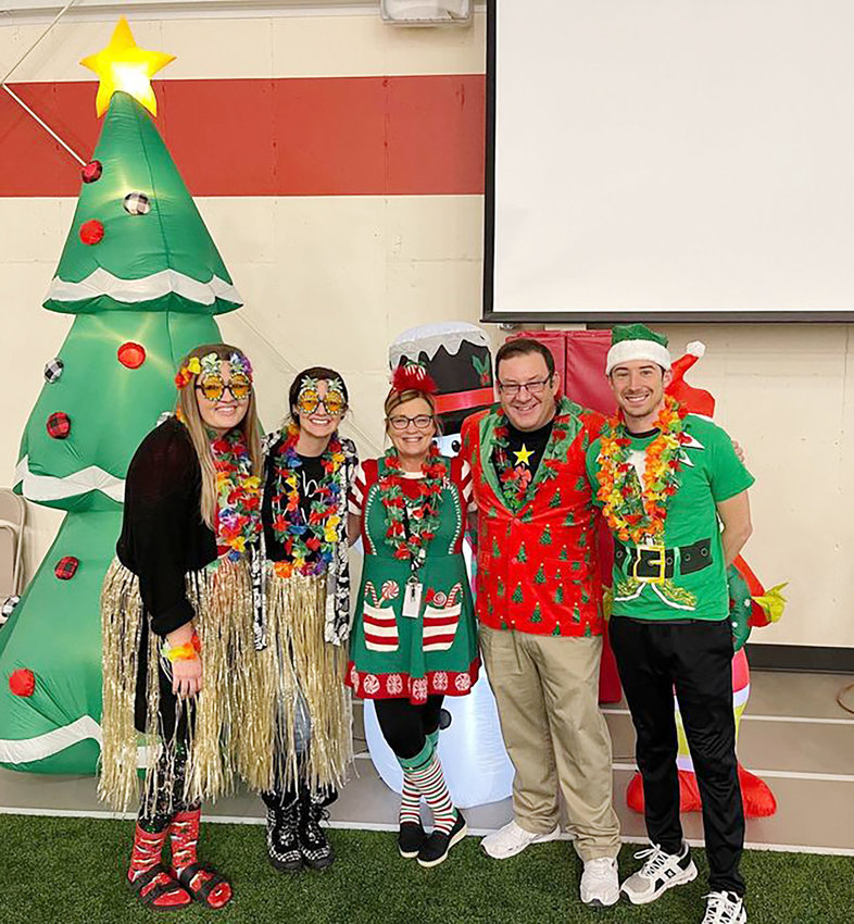 Even the teacher got into the holiday spirit during the assembly.