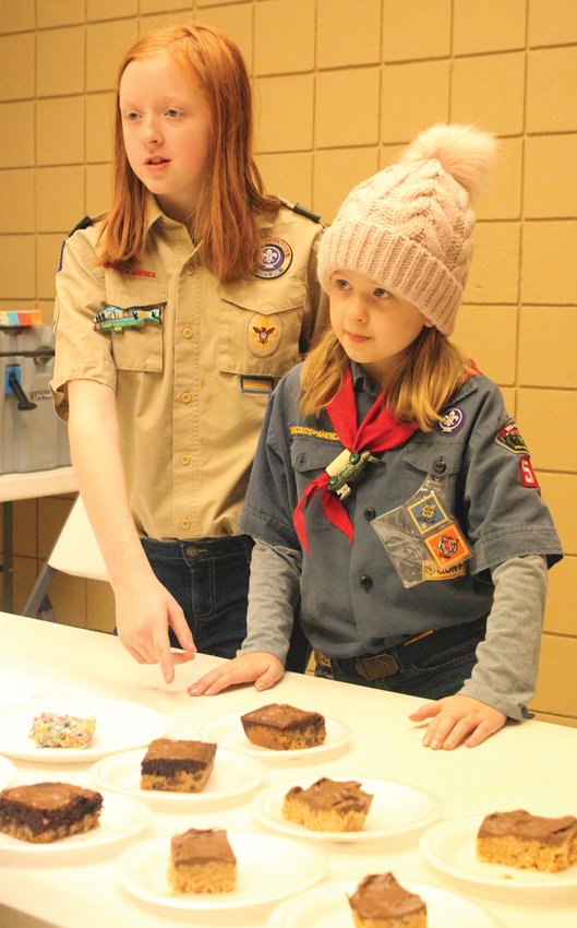 Scouts of all ages worked together to make the annual Cub Scout Soup Supper fundraiser a success. The event was held on Saturday, Jan. 28. Here you can see Alli and Jordynn Goodsell working together to help community members pick out sweet treats.
