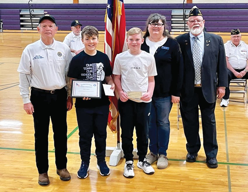 On Thursday, Feb. 2, American Legion Posts 224 and 444 celebrated two local 5th graders in the Iowa 5th Grade Flag Essay Contest. Dow City Post 444’s winner, Lane Martins (third from left), has moved on to the American Legion State of Iowa contest. Dunlap Post 224’s winner, Charlie Follman
(second from left), has moved on to the American Legion District contest. They are pictured with Doyle Siglin, Commander of Post 444 (left), Jen Miller, Commander of Post 224 (second from right), and a representative from the 8th American Legion District (far right).