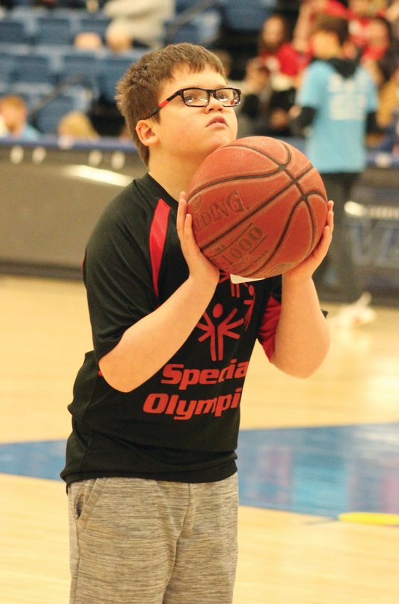 Liam Murphy prepared for a perfect shot during the 2023 basketball special Olympics.