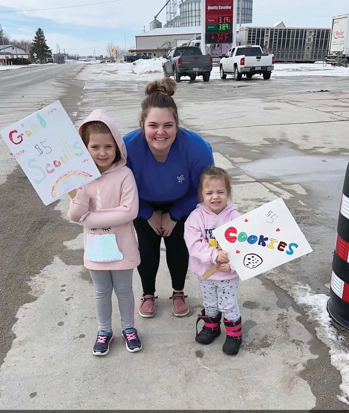 The Girl Scout cookie fundraiser has officially begun! Over the weekend Troop 163 of Boyer Valley was out in the community working hard to raise funds for the organization. Here Brinlee Holtz, her sister Laynee Holtz and mom Danielle Holtz show off homemade signs to bring in customers.