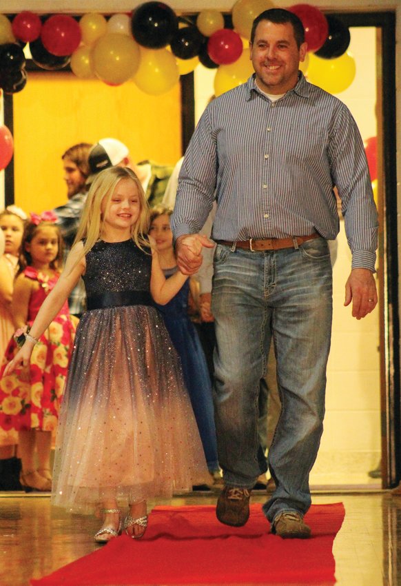 The little princesses enjoyed having a chance to be in the spotlight during the father-daughter dance.