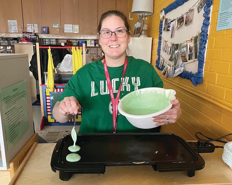 Staci Anderson of Missouri Valley Schools helped make green pancakes and milk for the preschool class to celebrate Dr. Suess.